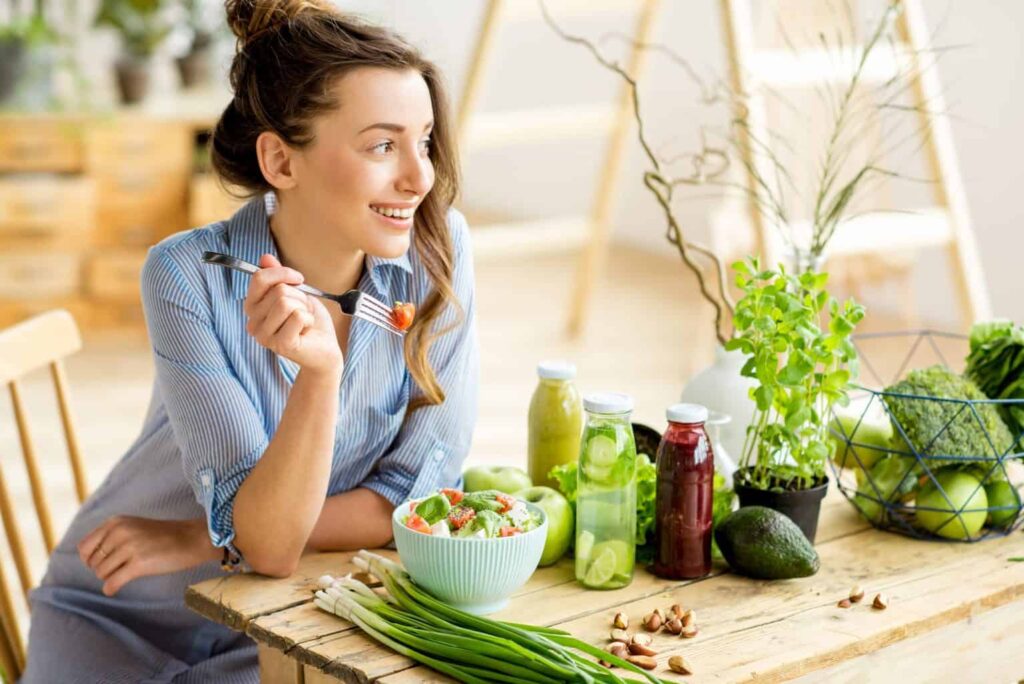 Lady eating plant based foods for better hydration